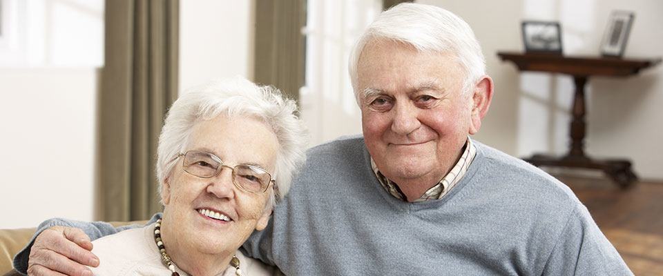 A couple sits in an Assisted Living Community in Arizona